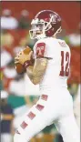  ?? Brian Blanco / Getty Images ?? Temple quarterbac­k Logan Marchi looks for a receiver during a Sept. 21 game against South Florida.