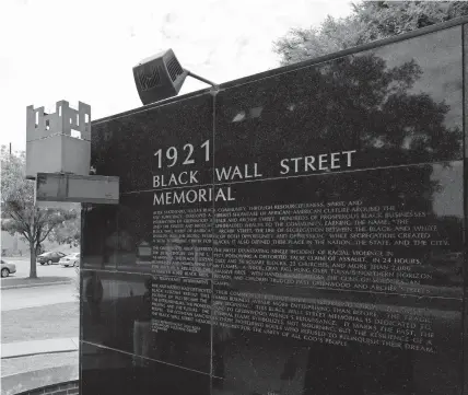  ??  ?? The Black Wall Street of 1921 Memorial i shown June 12 at the Greenwood Community Center in the historic Greenwood District in North Tulsa. [DOUG HOKE/ THE OKLAHOMAN]