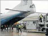  ??  ?? ALL ABOARD: The chartered plane is ready to transport the heavy cargo to Chad