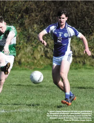  ??  ?? Legion’s Conor Keane has his shot on goal blocked by Templenoe goalkeeper, watched by Templenoe’s Kieran O’Nell and John Spillane, in their County SFL Division 1 game at Derreen, Killarney on Sunday. Photo by Michelle Cooper Galvin