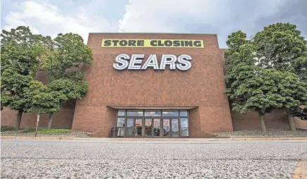  ?? ROBERT FRANKLIN/SOUTH BEND TRIBUNE ?? Shown Aug. 19, 2019, “Store Closing” signage was recently added at the Sears store at University Park Mall in Mishawaka. After 91 years of being a retail giant in the area, the store closed in November 2019.