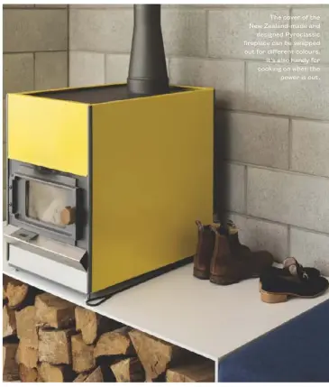  ??  ?? The cover of the New Zealand-made and designed Pyroclassi­c fireplace can be swapped out for different colours. It’s also handy for cooking on when the power is out.