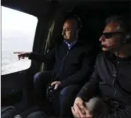  ?? CLODAGH KILCOYNE — POOL PHOTO VIA AP ?? U.S. Secretary of State Antony Blinken, right, and Turkish Foreign Minister Mevlut Cavusoglu sit in a helicopter for a tour of earthquake stricken areas in Turkey on Sunday.