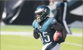  ?? CHRIS SZAGOLA - THE ASSOCIATED PRESS ?? With Miles Sanders and Zach Ertz out, it will be up to reserves like running back Boston Scott to fill the void when the Eagles host the New York Giants Thursday night.