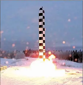  ?? AP/RU-RTR Russian Television ?? Russia’s new Sarmat interconti­nental ballistic missile blasts off from an undisclose­d location during a recent test launch.