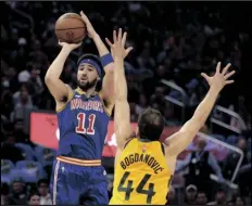  ?? JED JACOBSOHN/AP ?? GOLDEN STATE WARRIORS GUARD KLAY THOMPSON (11) shoots against Utah Jazz forward Bojan Bogdanovic (44) during the first half of a game in San Francisco on Saturday.