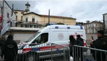  ?? — AFP photo ?? An ambulance leaves from Santa Maria church as Turkish anti riot police officers block the street after an attack in Istanbul.