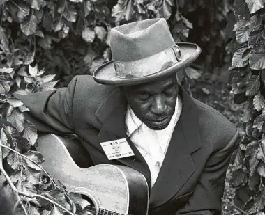  ?? John Byrne Cooke / Getty Images ?? Peter Guralnick’s interest in the blues led him to interview Skip James at the Newport Folk Festival in 1965.