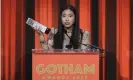  ?? Photograph: Evan Agostini/Invision/AP ?? Awkwafina accepts the Gothams’ best actress award for The Farewell.