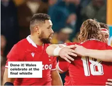  ?? ?? Done it! Wales celebrate at the final whistle