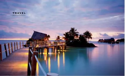  ??  ?? LEFT: Likuliku’s bures offer the utmost in luxury. Each has private ocean access and a glass-bottom floor. BELOW: Executive chef Shane Watson is proud of his sustainabl­e garden; the seafood is freshly caught.