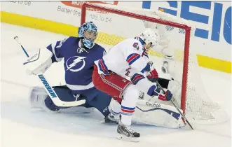  ?? DOUGLAS R. CLIFFORD/ THE ASSOCIATED PRESS ?? Tampa Bay goalie Ben Bishop is beaten by New York’s Rick Nash during Game 4 Friday in the Eastern Conference final. Nash had two goals as the Rangers tied the series.