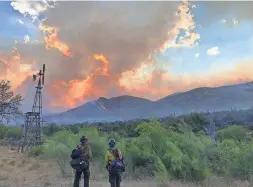  ??  ?? The Woodbury Fire is burning in the Superstiti­on Wilderness area about 5 miles northwest of Superior.