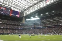  ?? AP file photo ?? The opening kickoff of an NFL wild-card playoff game between the Texans and Browns on Jan. 13 in Houston is pictured.