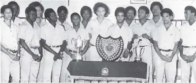  ?? GLEANER FILE PHOTO ?? 1971 TRIPLE CHAMPIONS – WOLMER’S: In front (from left) are: Hugh Fisher, Fitzroy Robinson, Carl Smith, Vermont Samuda, Keith Tulloch (captain), Karl Largie, Dervin Garvey and Paul Pringle. Back row (from left): Frank Lawrence, Jeffrey Mordecai, Richard...