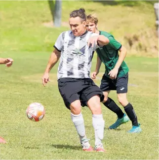  ??  ?? Jindrich Hahn scored one of Te Puke’s four goals in the win against Te Awamutu.