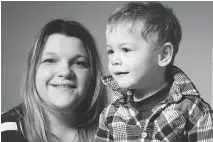  ??  WAYNE CUDDINGTON/OTTAWA CITIZEN ?? Mallory Olsheski with son Riley, 2, who can’t get vaccinated because he has had a heart transplant.