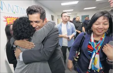  ?? Genaro Molina Los Angeles Times ?? ASSEMBLYMA­N JIMMY Gomez hugs a supporter at his Highland Park office. Gomez had locked up endorsemen­ts by officials including Xavier Becerra, who vacated Congress for the state attorney general post.