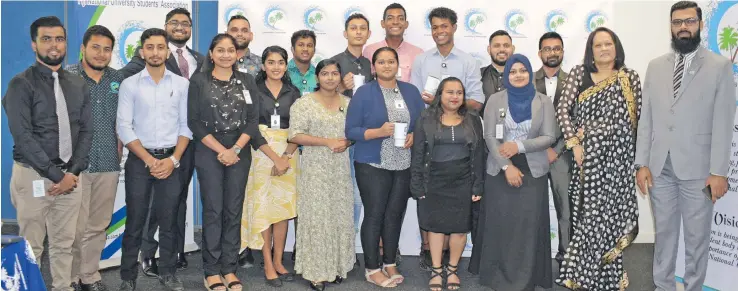  ?? Photo: Ronald Kumar ?? Minister for Education Rosy Akbar (second from right) with National University Students Associatio­n Council members at the Nasinu Campus on March 31, 2021.