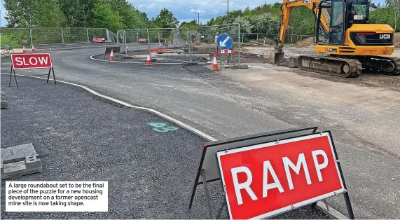  ?? ?? A large roundabout set to be the final piece of the puzzle for a new housing developmen­t on a former opencast mine site is now taking shape.