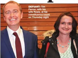  ??  ?? DEFIANT: Tim Farron, with his wife Rosie, at his constituen­cy count on Thursday night