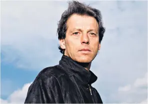  ??  ?? Leslie Grantham: his menacing panache, as well as the tabloids’ interest in his early life, helped boost Eastenders to the top of the ratings