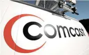  ?? Gene J. Puskar / Associated Press file ?? Comcast’s Time Warner Cable deal is for $45 billion.