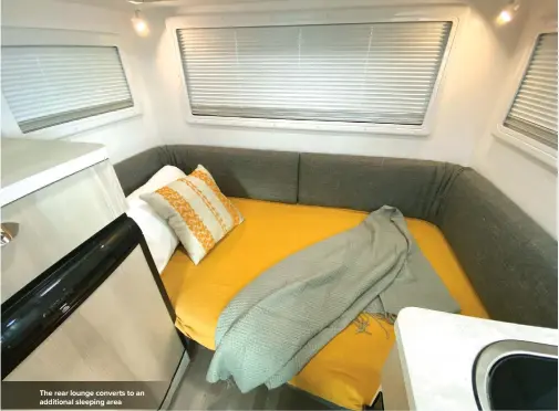  ??  ?? The rear lounge converts to an additional sleeping area