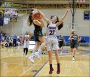  ?? MJ MCCONNEY - FOR MEDIANEWS GROUP ?? Pottsgrove’s Sierra Potts (22) blocks the drive of Methacton’s Tori Bockrath during their PAC semifinal Saturday at Spring-Ford.