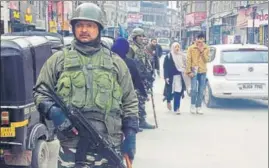  ?? ANII ?? CRPF personnel keep vigil after militants killed two police personnel, in Srinagar on Saturday.