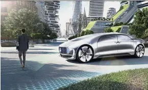  ??  ?? The Mercedes F 015 limousine, unveiled two years ago, uses a laser to project zebra crossings and stop signs onto the tarmac. — Daimler AG/dpa