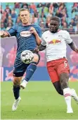  ?? FOTO: C. WOLFF ?? Rouwen Hennings im Duell mit Leipzigs Dayot Upamecano.