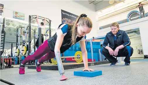  ??  ?? IN TRAINING: Aberdeen swimmer Toni Shaw, 15, can dream of Tokyo 2020 now that she has a cutting-edge prosthetic to help her exercise