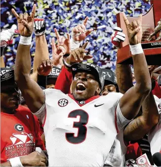  ?? CURTIS COMPTON / CCOMPTON@AJC.COM ?? Roquan Smith, MVP of the SEC title game and winner of the Butkus Award as the nation’s top linebacker, might leave after three seasons to turn pro — just like Herschel Walker.