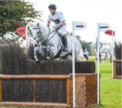  ??  ?? Harry Meade and four-star first-timer Away Cruising land 15th place