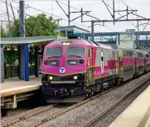  ?? Dan Zukowski ?? Westbound diesel-powered commuter train at Route 128 may be replaced by EMUs as soon as 2024 in a pilot project. EMUs will deliver faster, more frequent, bidirectio­nal service. Existing catenary serves Amtrak’s Northeast Corridor trains.