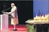  ?? PTI PHOTO ?? ▪ Prime Minister Narendra Modi addresses the Indian diaspora at Dubai Opera, where he launched a project to construct the first Hindu temple in Abu Dhabi on Saturday.