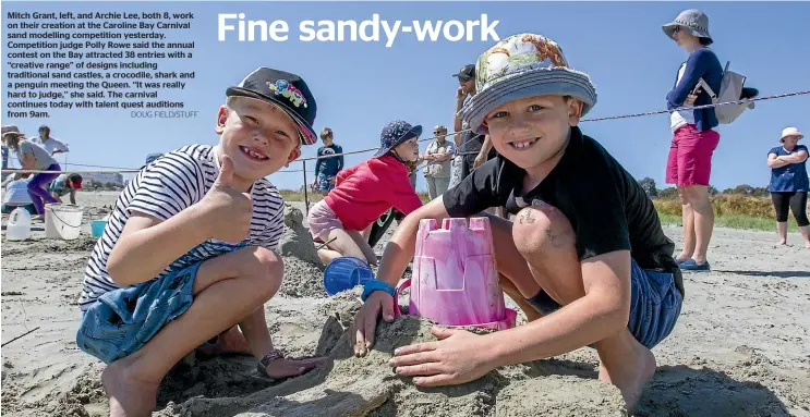  ?? DOUG FIELD/STUFF ?? Mitch Grant, left, and Archie Lee, both 8, work on their creation at the Caroline Bay Carnival sand modelling competitio­n yesterday. Competitio­n judge Polly Rowe said the annual contest on the Bay attracted 38 entries with a ‘‘creative range’’ of designs including traditiona­l sand castles, a crocodile, shark and a penguin meeting the Queen. ‘‘It was really hard to judge,’’ she said. The carnival continues today with talent quest auditions from 9am.