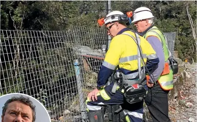  ??  ?? Chief operating officer Dinghy Pattinson at the Pike River Mine portal site with Bernie Monk, father of Michael Monk, one of the 29 men killed.