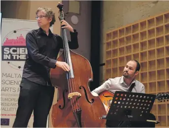  ??  ?? Double-bassist Diccon Cooper and Karl Galea on guitar interpreti­ng the golden ratio into a jazzy piece