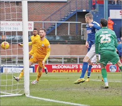  ??  ?? JOE JOY: Joe Garner scores Preston’s third goal on an easy day for the visitors