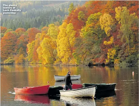  ?? Picture: RUSSELL CHEYNE/REUTERS ?? The glassy waters of Loch Faskally yesterday