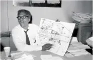  ?? AP PHOTO ?? Bayard Rustin, deputy director of the planned march on Washington program, points to a map showing the line of march for the demonstrat­ion for civil rights during a news conference in New York on Aug. 24, 1963.