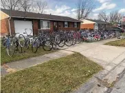  ?? CONTRIBUTE­D PHOTOS ?? David Nugent never charges the families who come to get bicycles he has repaired. He fills his yard in Brookville monthly with hundreds of bikes ready to give to children.