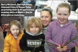  ??  ?? Kerry McCourt, Darragh Foley, Alannah Foley &amp; Megan Foley practising their St Brigid’s Cross making skills at Biddy’s Day in Killorglin on Saturday.