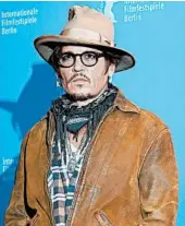  ?? MARKUS SCHREIBER/AP ?? Two former romantic partners of actor Johnny Depp, shown in February, have defended him in his libel suit.