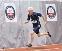  ?? JIM THOMPSON/JOURNAL ?? Roger Assink runs the 200-meter dash in the men’s 70-74 age division at the USATF Masters Indoor Championsh­ips.