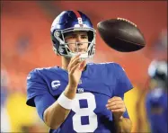  ?? Alex Brandon / Associated Press ?? New York Giants quarterbac­k Daniel Jones is tossed a football during warmups before the start of a game against the Washington Football Team on Sept. 16.