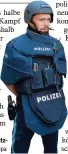  ?? Foto: Sven Hppe, dpa ?? Ein Polizist mit neuester Schutz ausstattun­g.