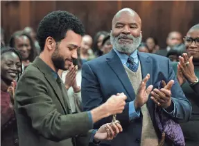  ?? PHOTOS BY TOBIN YELLAND/PROVIDED BY FOCUS FEATURES ?? Aren (Justice Smith) and Roger (David Alan Grier) in a scene of “The American Society of Magical Negroes.”